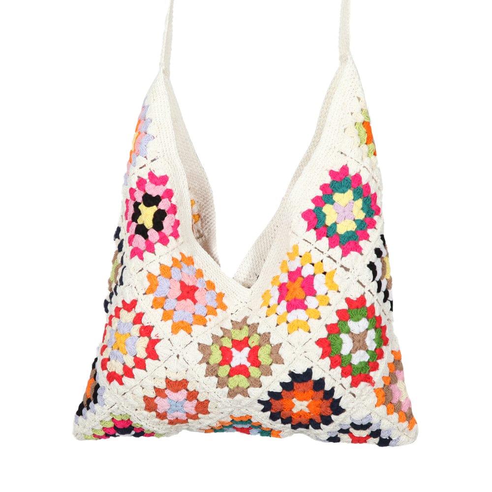 Artisan-crafted crochet shoulder bag showcasing vibrant granny squares, perfect for hippy aesthetics; 15" x 16" size and a stylish accessory for carrying essentials.