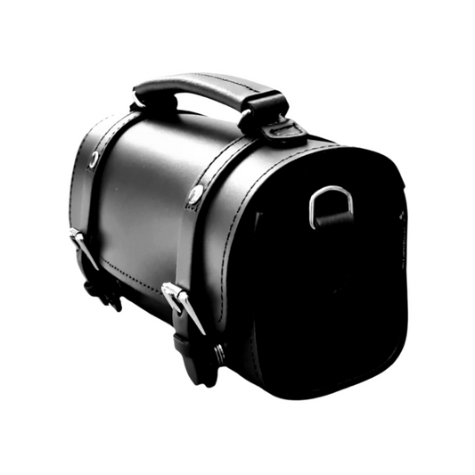 Close-up view of Zatchels Handmade Black Leather Bowler Bag's exquisite craftsmanship, highlighting the quality leather and versatile design with an adjustable strap.