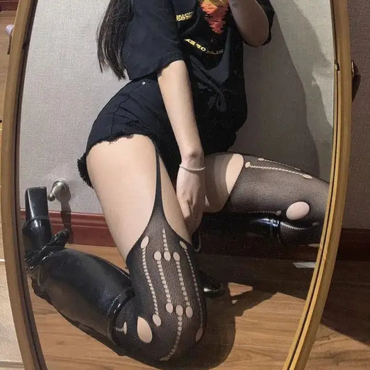 Chic and stylish look of Elegant Women's Fishnet Tights, worn with casual attire, highlighting versatility for both casual and formal occasions.