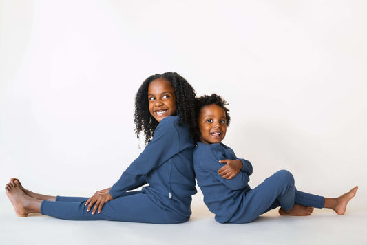 DreamBuy family matching pyjamas in elegant midnight blue, designed for comfort with a minimalist style, perfect for cozy nights and family gatherings.