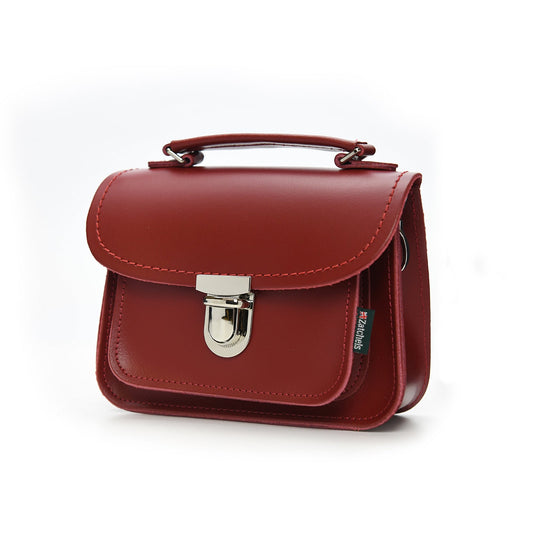 Stylish Luna Handmade Red Leather Bag featuring a contemporary design, secure clasp, and adjustable strap, ideal for elevating any outfit day or night.