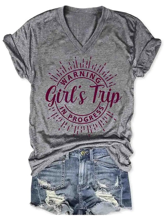 Women's Vibrant Warning Girl's Trip V-Neck Tee in elegant grey, featuring the eye-catching 'Warning: Girl's Trip In Progress' print, perfect for stylish adventures with friends.