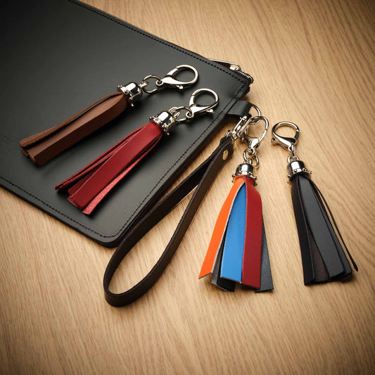 Stylish Handcrafted Chestnut Mini Tassel Bag Charm, featuring a decorative tassel and premium leather. A versatile keychain accessory to elevate your personal style.
