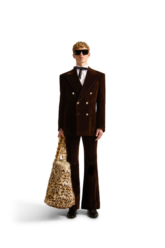 Chic interior view of oversized faux fur shoulder bag showcasing zipper compartments and button close pouch, crafted in Italy.