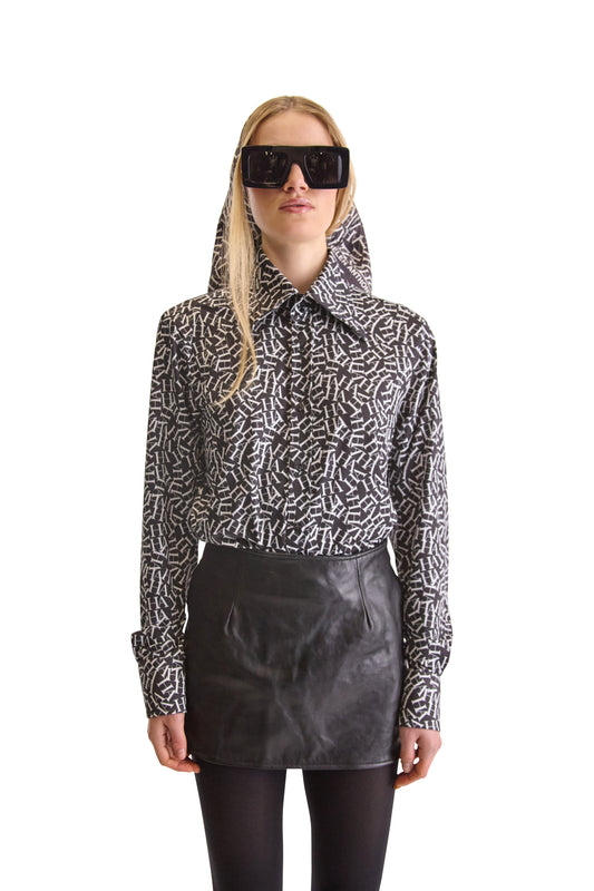 Elegant long-sleeve shirt featuring a refined initial monogram design, crafted from premium woven fabric.