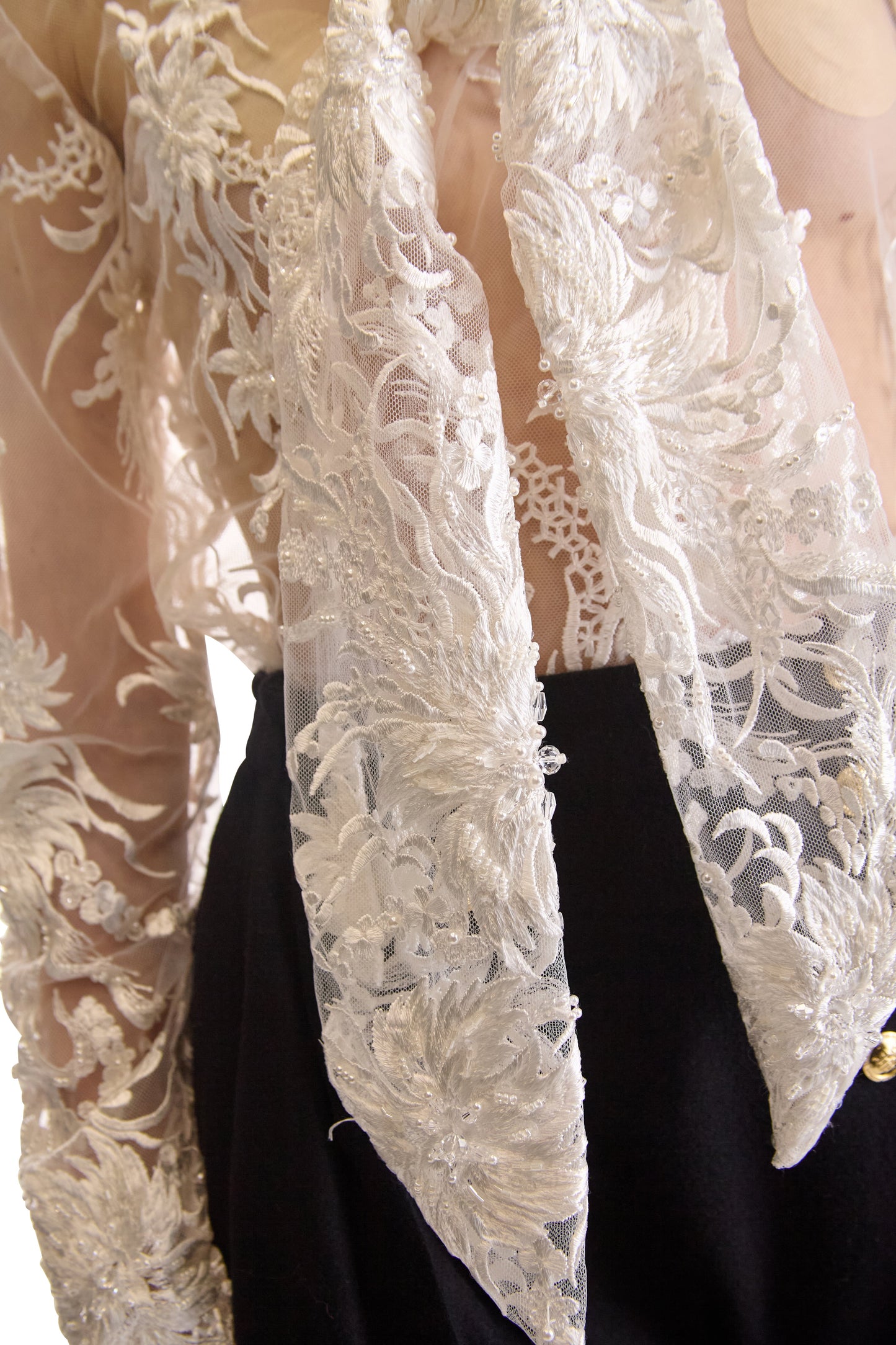 Close-up of the unique hand embroidery and encrusted bead details on the Helen Anthony blouse, embodying luxury craftsmanship made in Italy.