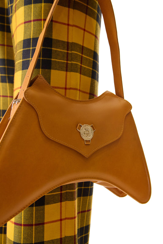 Interior view of Helen Anthony small shoulder bag featuring luxurious satin lining and magnetic snap closure.