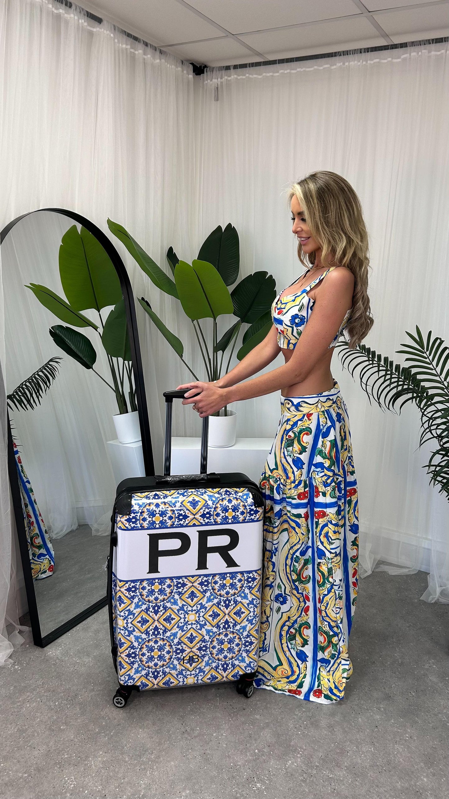 Chic Amalfi 2-Piece Bralette Crop Top and Maxi Skirt Set from Girl In the Mirror, capturing summer luxury with vibrant prints reminiscent of Dolce & Gabbana style, available in sizes S-L.