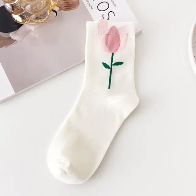 Luxurious Women's Tie-Dye Middle Tube Socks featuring an enchanting pink tulip design on a white backdrop, embodying vibrant comfort and style.