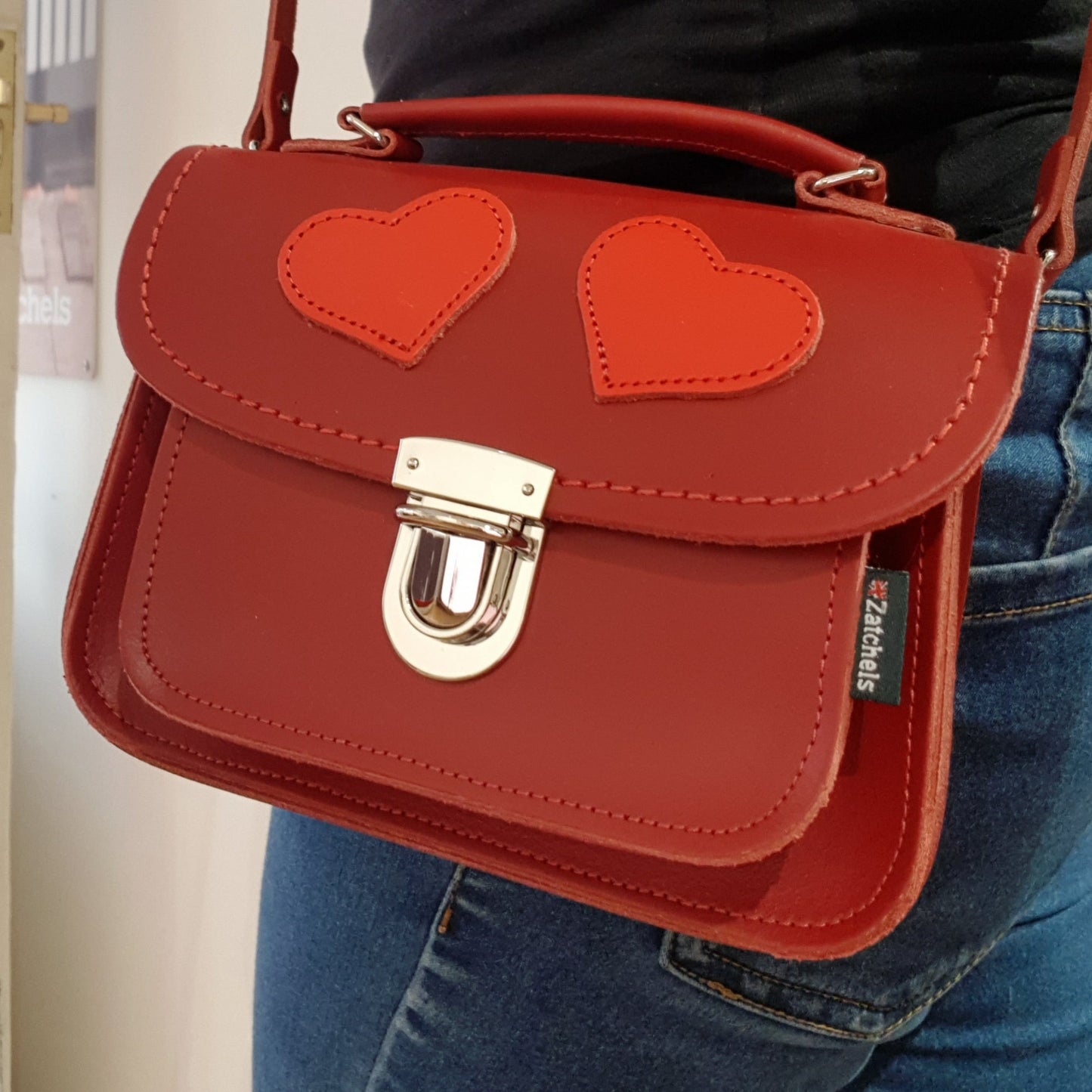 Versatile styling options of the Luna Handmade Leather Crossbody Bag, featuring detachable strap and secure push lock clasp, ideal for fashionable individuals.