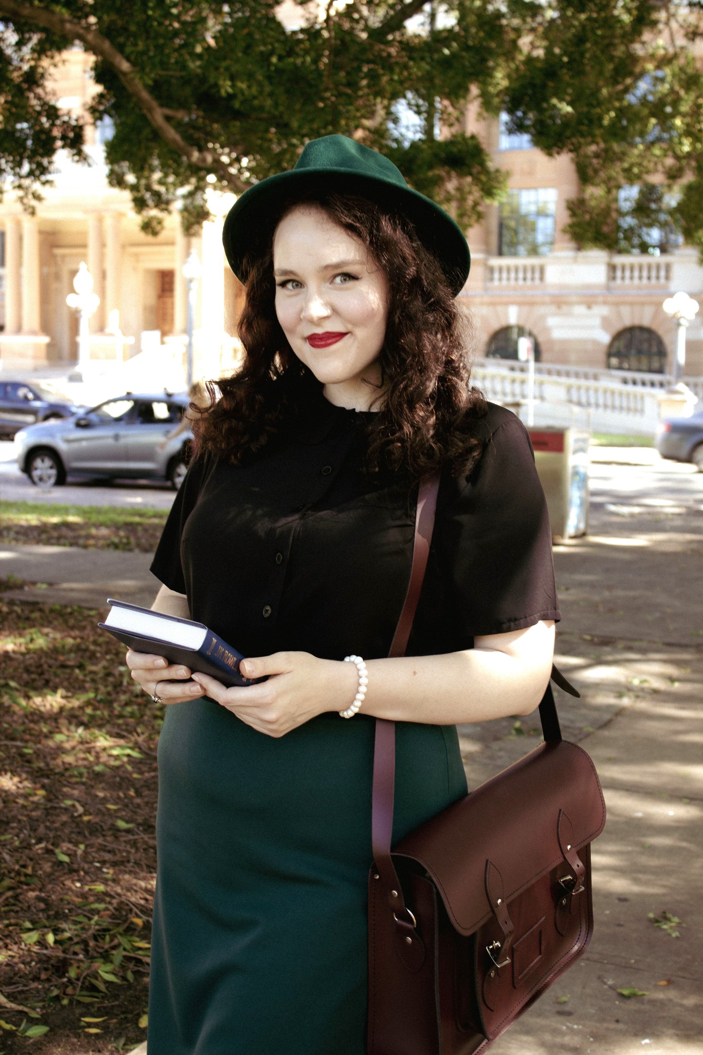 Interior view of the Luxury Marsala Red Leather Satchel, featuring spacious compartments ideal for tablets and laptops, embodying a blend of style and functionality.