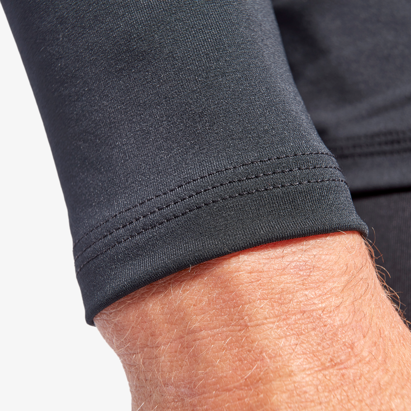 Close-up of KYMIRA Men's IR50 Infrared Recovery Long Sleeve Top, showcasing extra durable stitching and innovative infrared technology for enhanced recovery.
