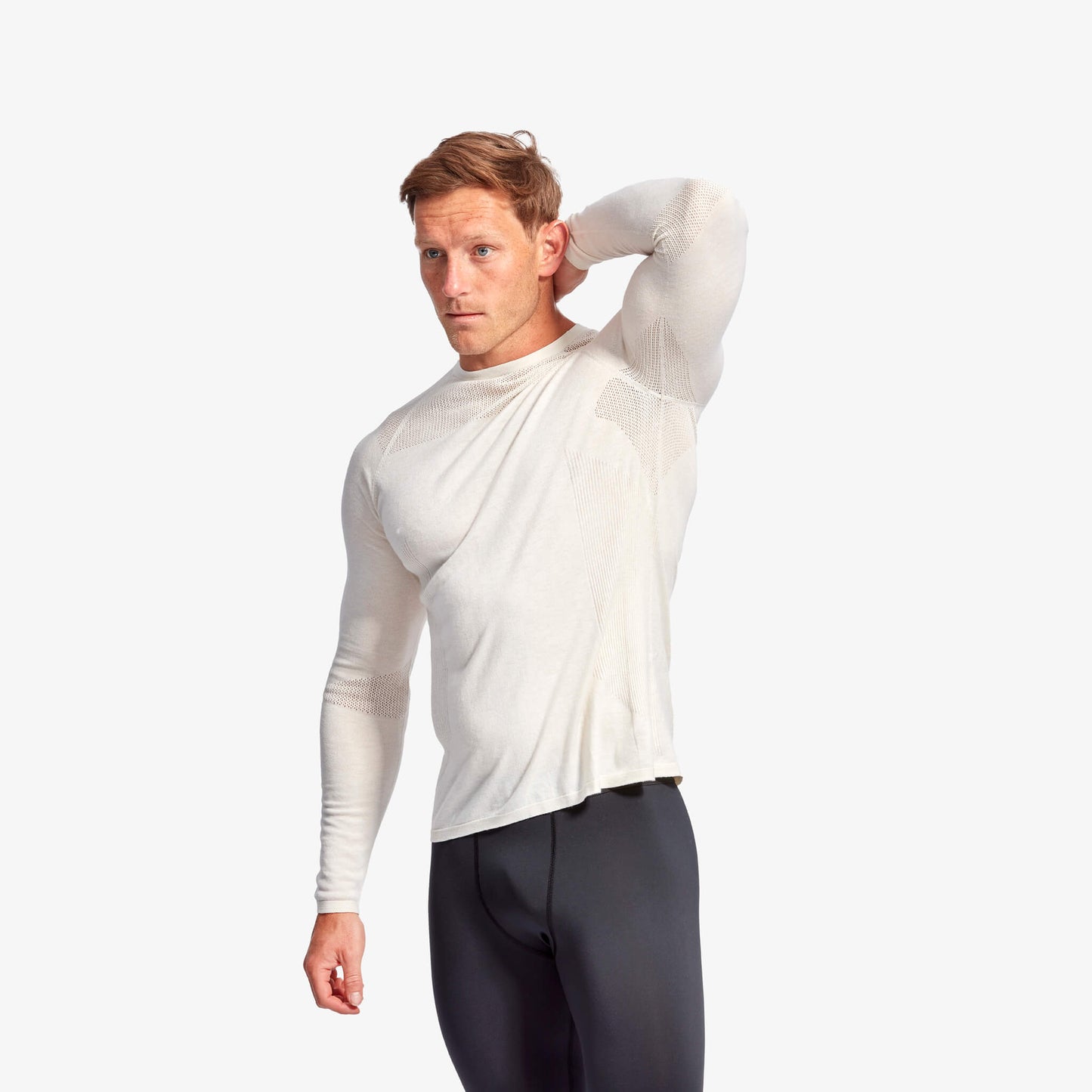 Close-up detail of KYMIRA's Men's Eco-Friendly Infrared Merino Baselayer Top, highlighting its premium recycled fabric and innovative cooling zones for optimal wear experience.