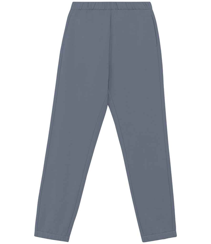 Model wearing eco-friendly ladies jog pants, highlighting the relaxed fit and versatile style suitable for layering and everyday comfort.