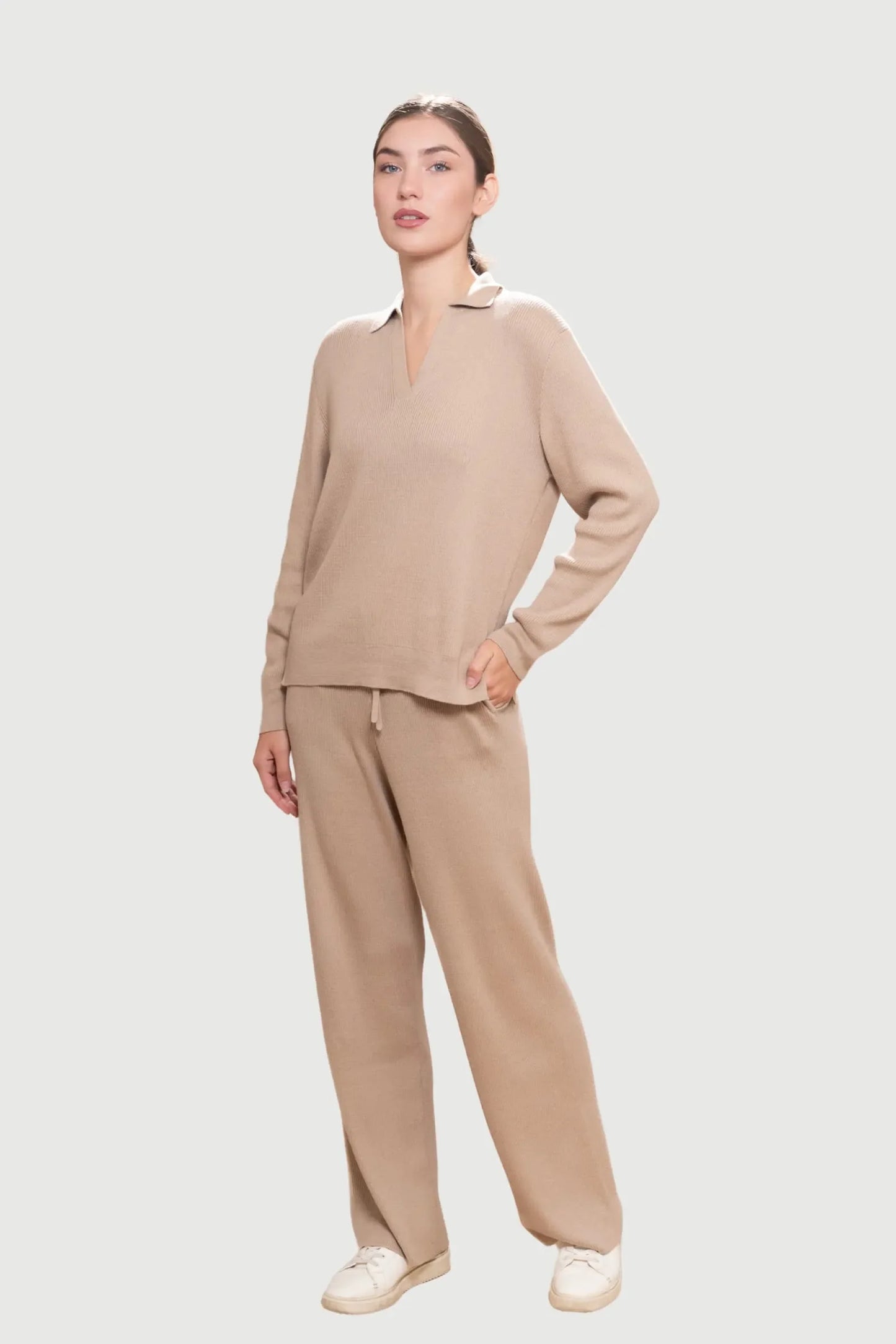 Luxury ribbed wide-leg loungewear trousers crafted from Pima cotton and baby alpaca, showcasing a relaxed silhouette and drawstring waistband ideal for elegant lounging.