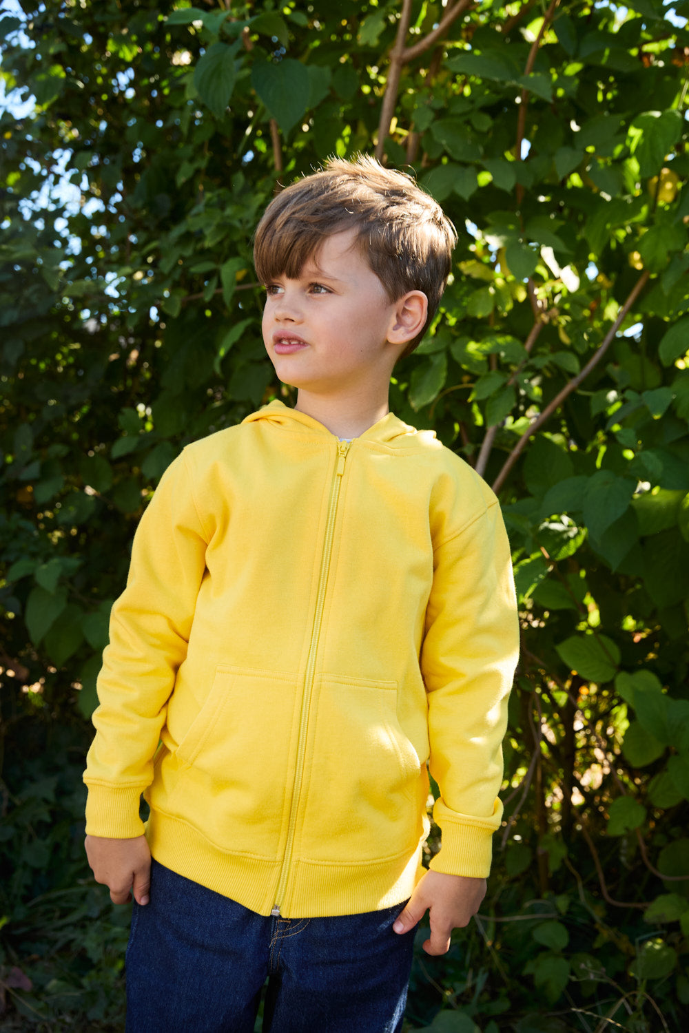 Luxurious heavyweight kids zipped hoodie with kangaroo pocket, crafted from Fairtrade organic cotton, suitable for ages 3-10, featuring a soft brushed interior and stylish double-layered cuffs.