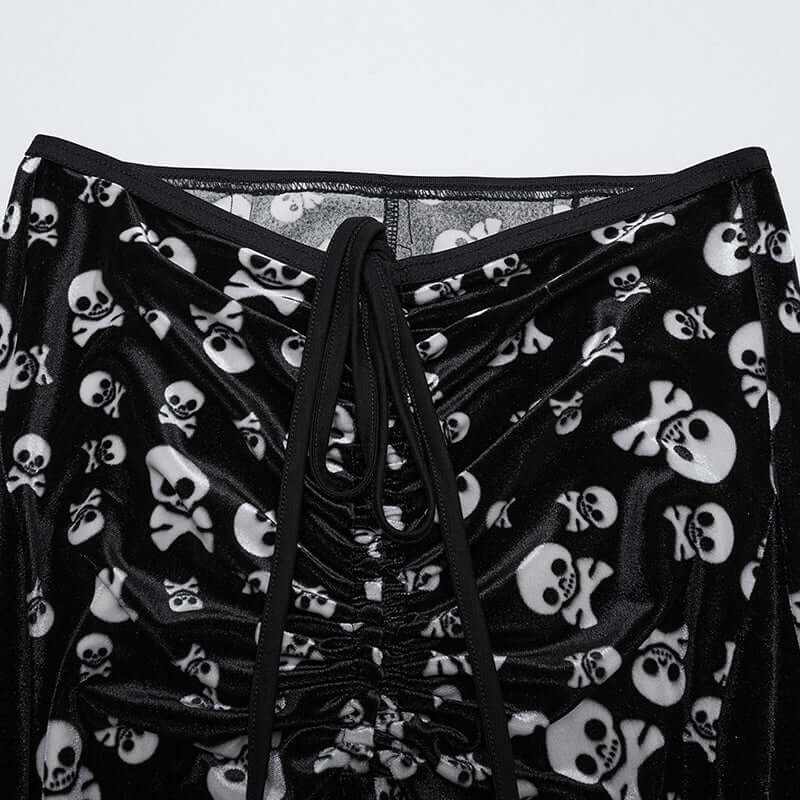 Punk Rave luxurious velvet flared trousers featuring intricate white skull print and an elegant waist tie, designed for gothic fashion lovers, showcasing a stylish blend of comfort and edgy aesthetics.