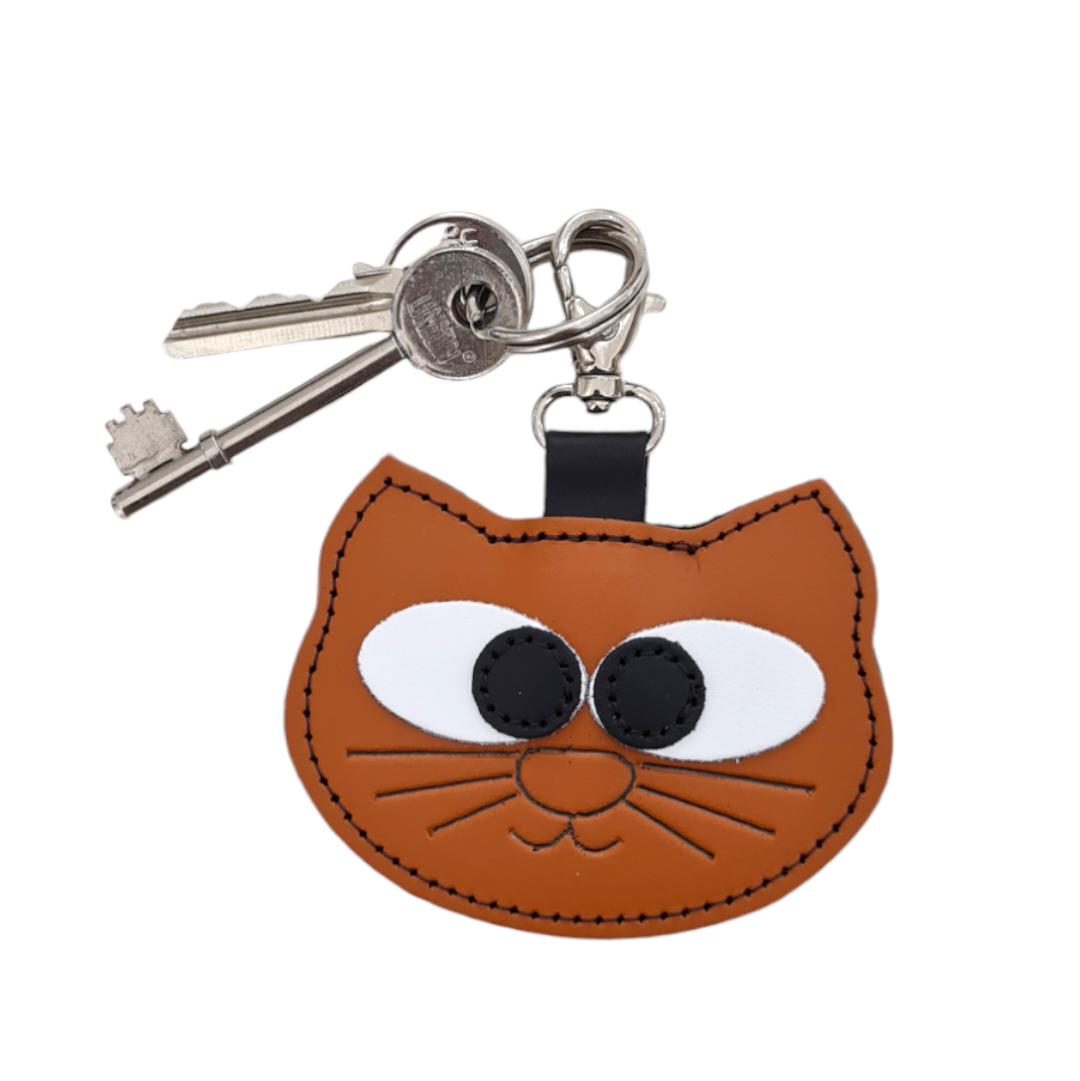 Close-up of the Handcrafted Leather Colourful Cat Bag Charm displaying intricate stitching and the Zatchels logo, emphasising unique craftsmanship and luxury design for cat lovers.