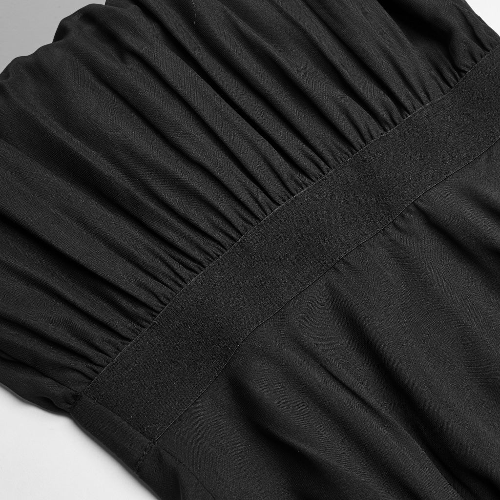 Close-up display of the Punk Rave Angelina dress showcasing the intricate button and pleat detailing on the bust, crafted from soft black chiffon.