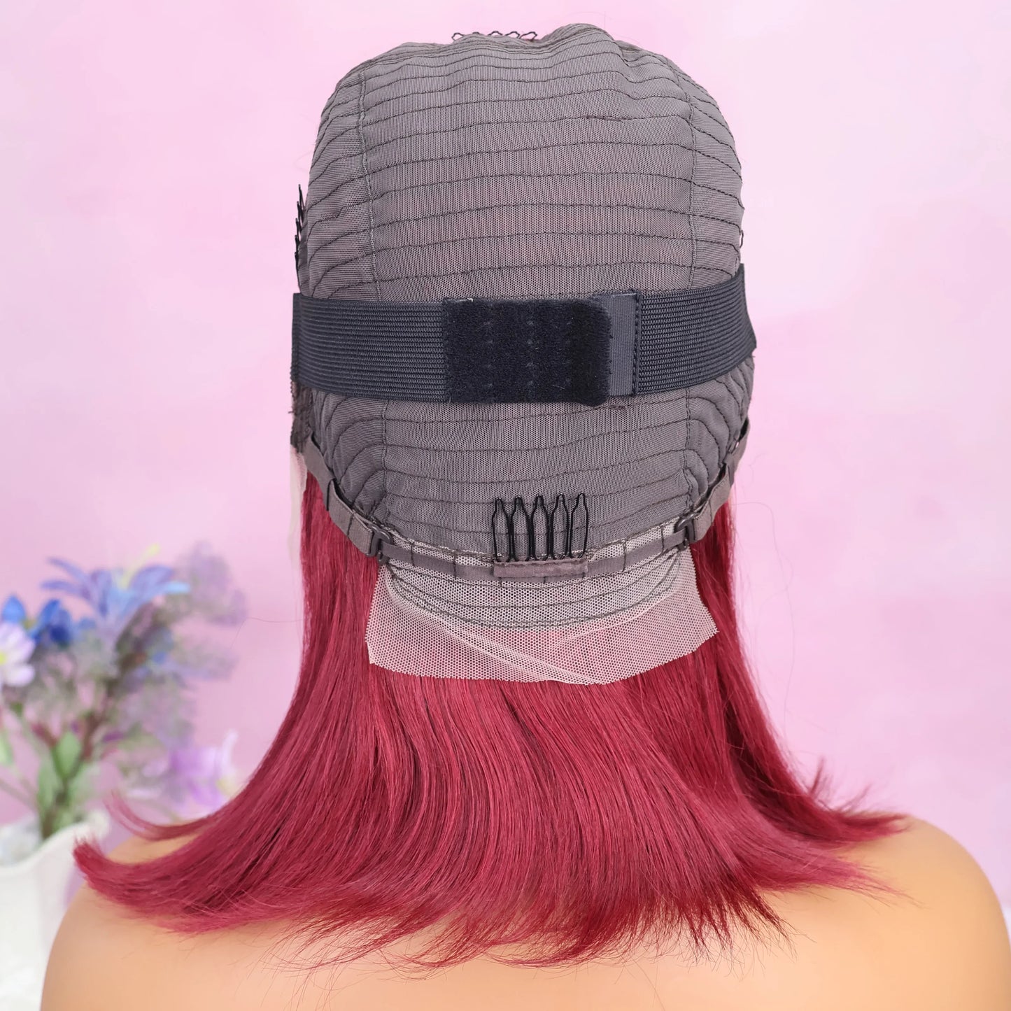 Back view of the 99J Burgundy 13x4 lace wig, showcasing the impeccable layer of the Brazilian Remy hair and expert craftsmanship.