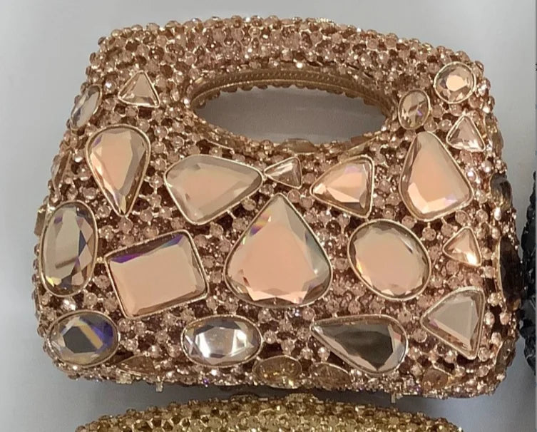 Luxurious women's clutch bag featuring an exquisite gold metallic and crystal design, perfect for glamorous evening events.