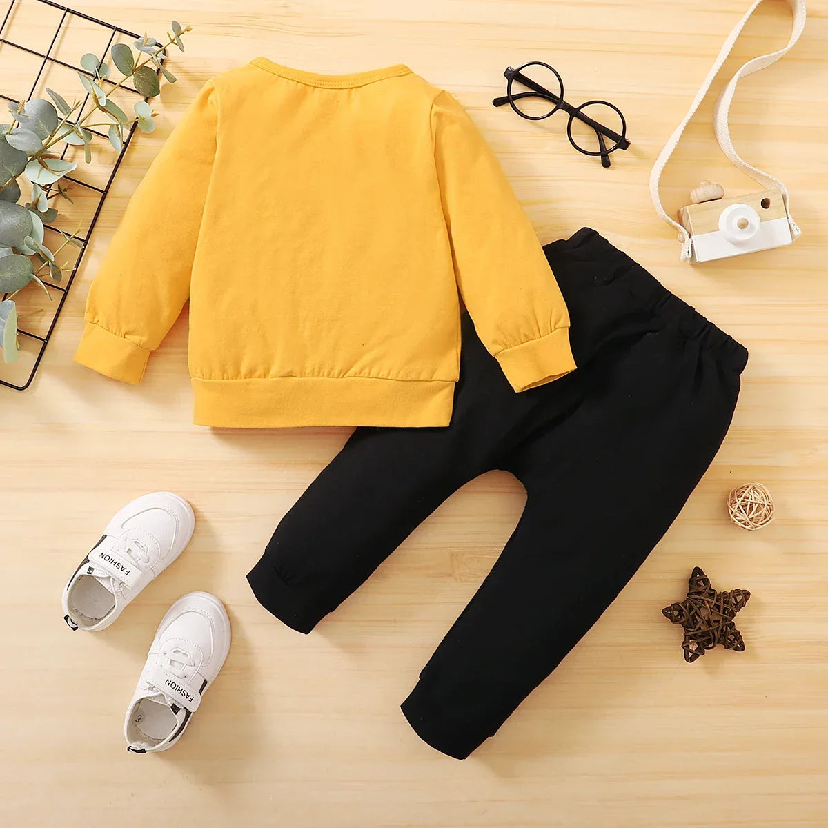 Elegant newborn boy's pants from a stylish 2-piece outfit, designed for comfort and style for infants aged 0-18 months.