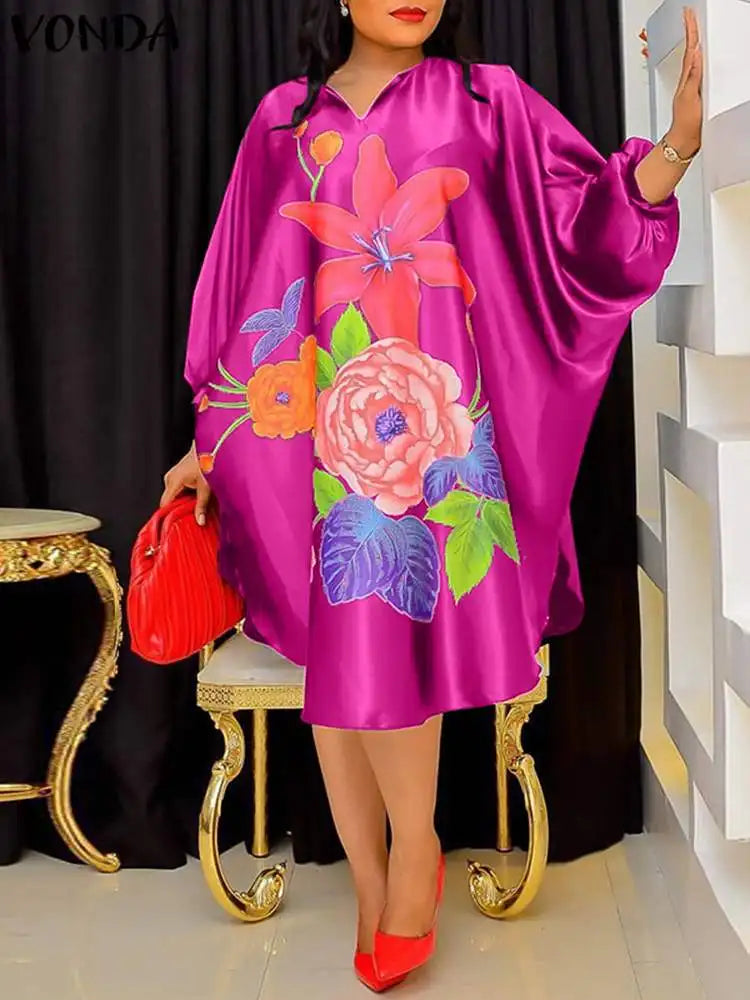 Luxurious Plus Size 5XL VONDA Women’s Bohemian Floral Midi Dress featuring elegant batwing sleeves and a sophisticated V-neck, perfect for a chic party or holiday look. Available in stunning rose red, black, and orange hues, crafted from premium 100% polyester with a loose fit for ultimate comfort.