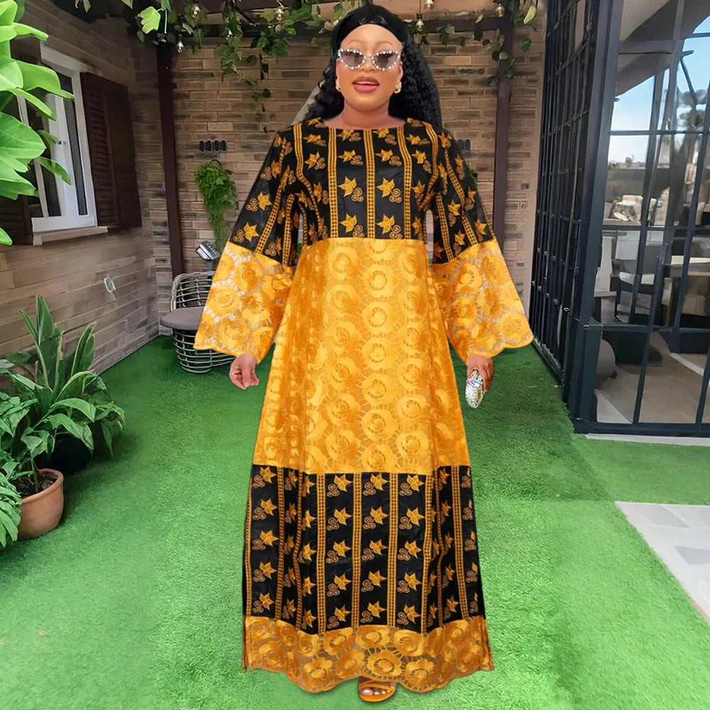 Sophisticated H&D dress elegantly designed for women, accentuated with vibrant embroidery, perfect for cultural events and stylish appearances.