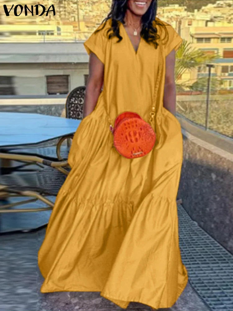 Elegant Plus Size Women's Bohemian Summer Sundress featuring a vibrant solid colour, short sleeves, and a relaxed loose fit, perfect for casual outings or beach holidays.