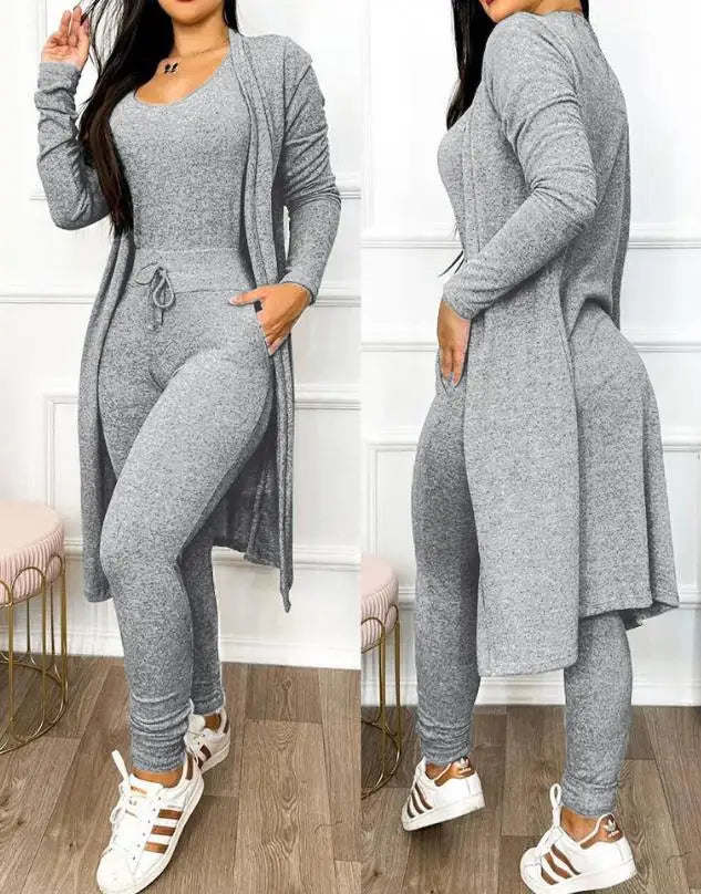Full outfit display of a fashionable women's jumpsuit set with a high waist and ankle-length pants, showcasing a versatile style ideal for both casual and formal occasions.