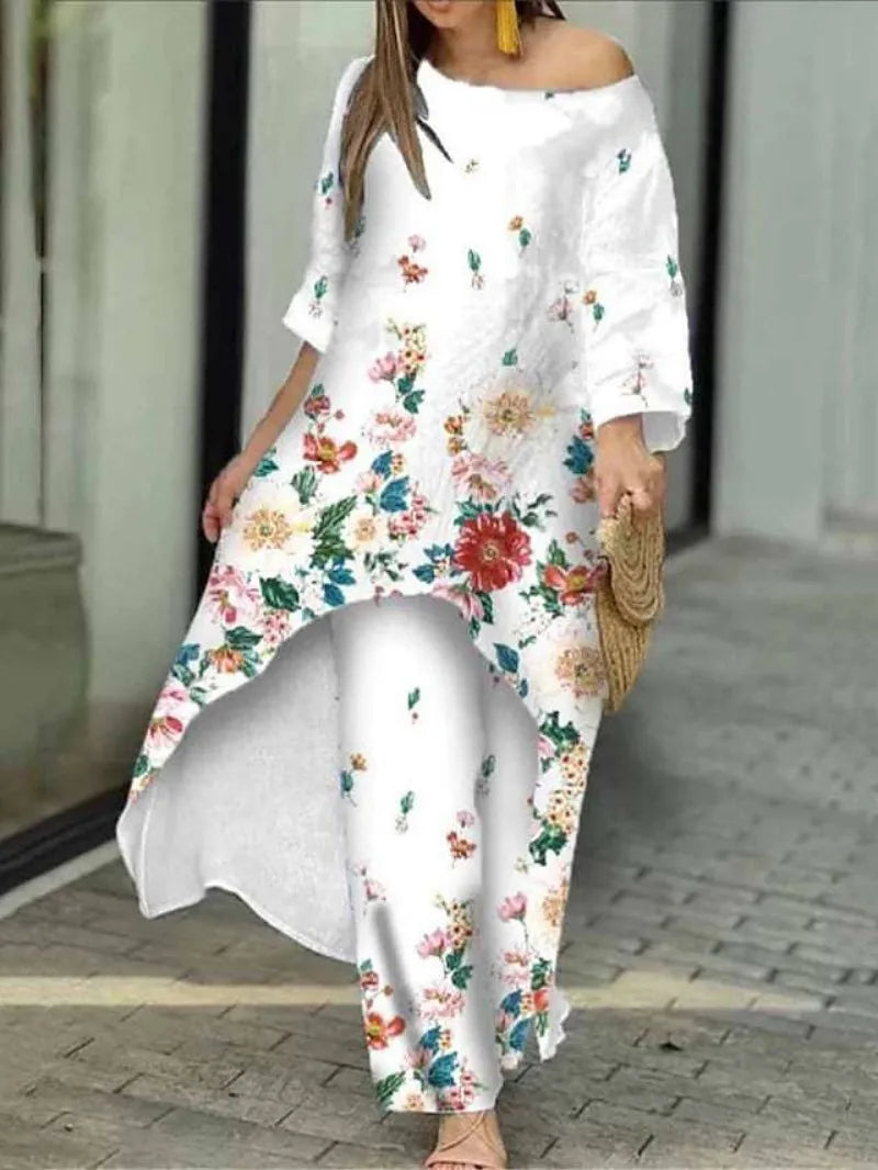 Complete look of the casual loose irregular printed shirt and high waist wide leg pants, epitomising modern luxury for women.