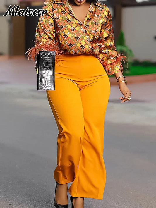 Chic Mlaiscsr Wide Leg Pants in a fashionable feather print, designed for the contemporary office lady, showcasing comfort and style in a high-waisted silhouette.