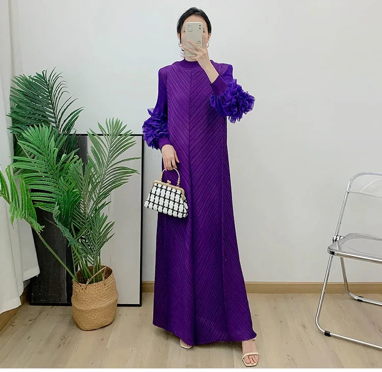 Fashionable and versatile ankle-length maxi dress for women, integrating luxurious polyester fabric with a pleated finish and petal sleeve design.