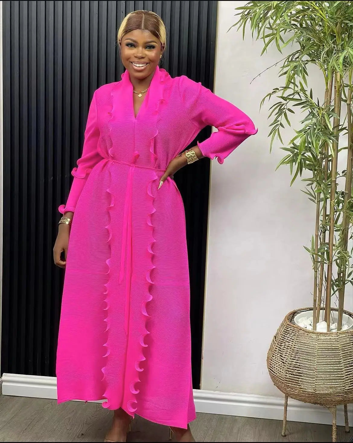 Close-up detail of ruffle sleeves and sashes on a luxury women’s abaya dress, showcasing high-quality fabric and exquisite craftsmanship ideal for Middle-Aged women.