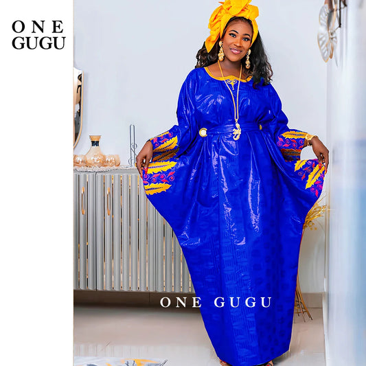 Luxury one-size Royal Blue African dress crafted in high-quality cotton and polyester, adorned with delicate embroidery lace and stones, ideal for traditional celebrations.