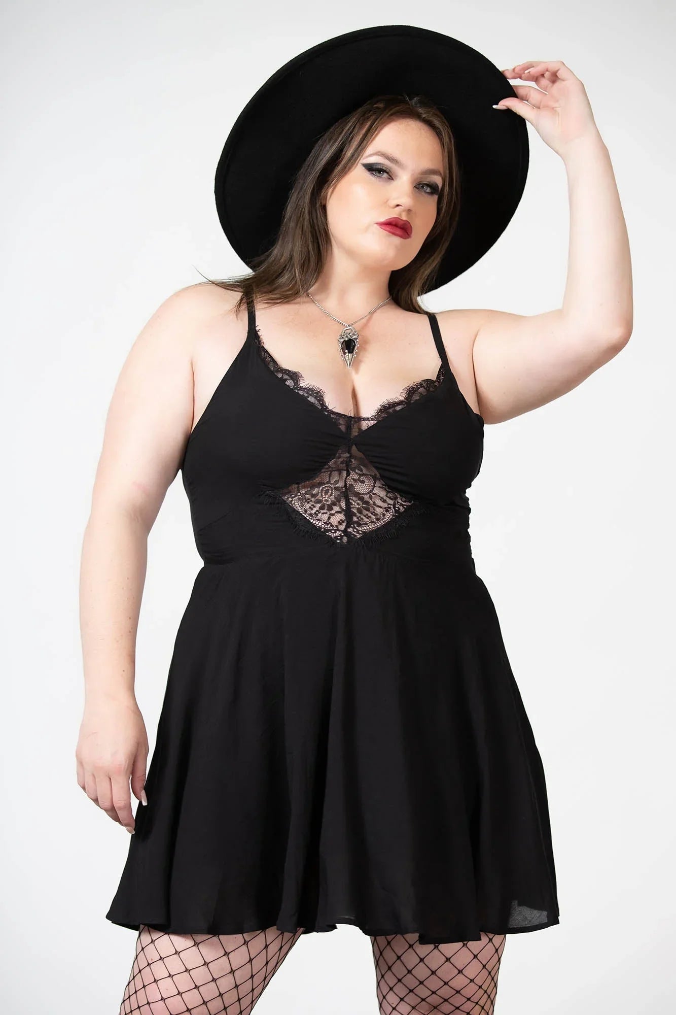 Beautiful close-up of the Killstar Sacralgia dress featuring intricate lace trim and a fitted bodice, epitomising gothic elegance and luxurious style for all occasions.