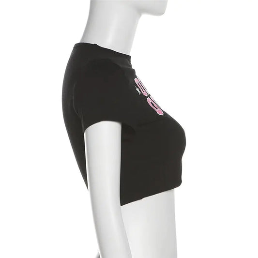 Profile view of the Drama Queen Star Graphic Baby Tee showcasing a stylish design, perfect for little girls. Crafted from soft fabric for ultimate comfort.