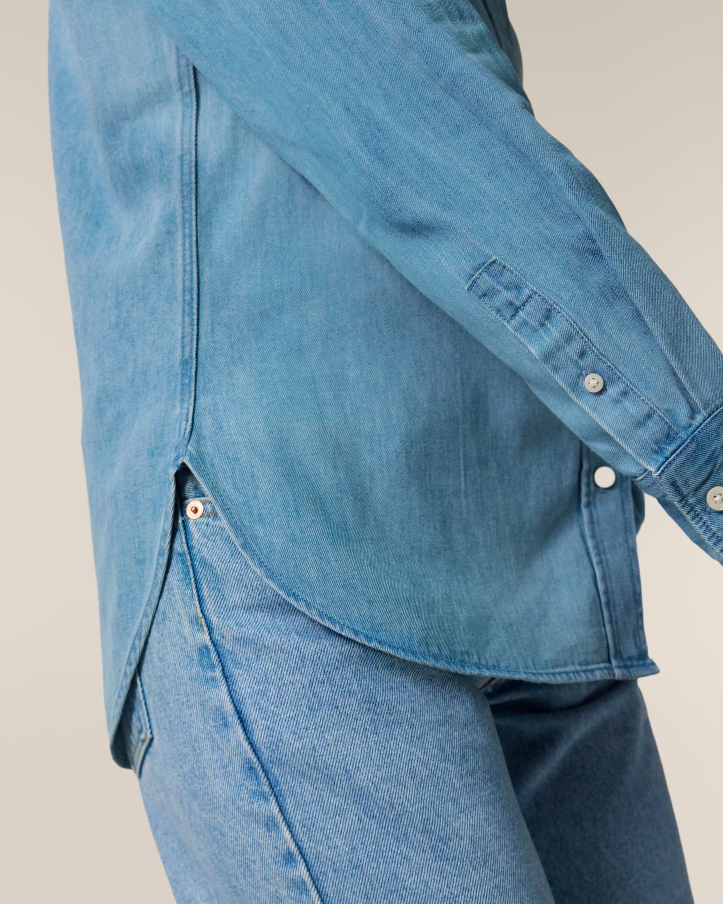Close-up view of the luxurious texture and quality of the Organic Cotton Long Sleeve Denim Shirt for Women, highlighting its sustainable craftsmanship and breathable fabric.