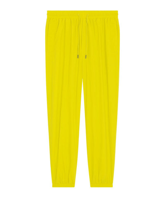 Stylish lightweight recycled nylon tracksuit bottoms, designed for relaxation and workout, exemplifying eco-conscious luxury.