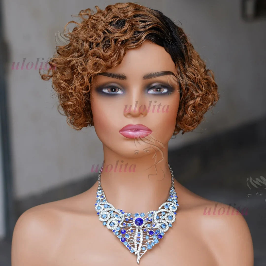 Stylish model wearing the Ombre Blonde T1B27 Pixie Cut Curly Bob Wig, exuding glamour and sophistication with its luscious curls and refined colour.