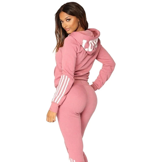 Elegant regular fit women's striped tracksuit showcasing a sophisticated design for casual sportswear.