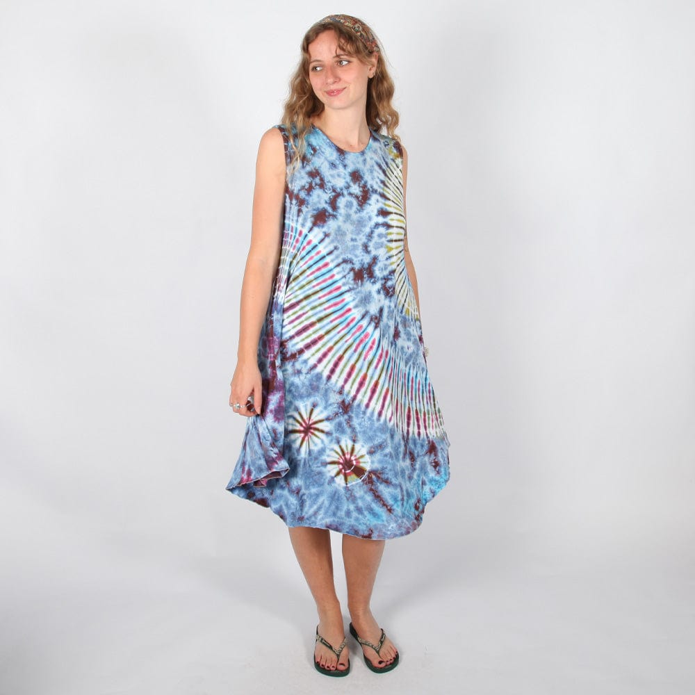 Elegantly styled vibrant tie dye midi dress paired with sandals, ideal for summer outings and fashion-forward looks.