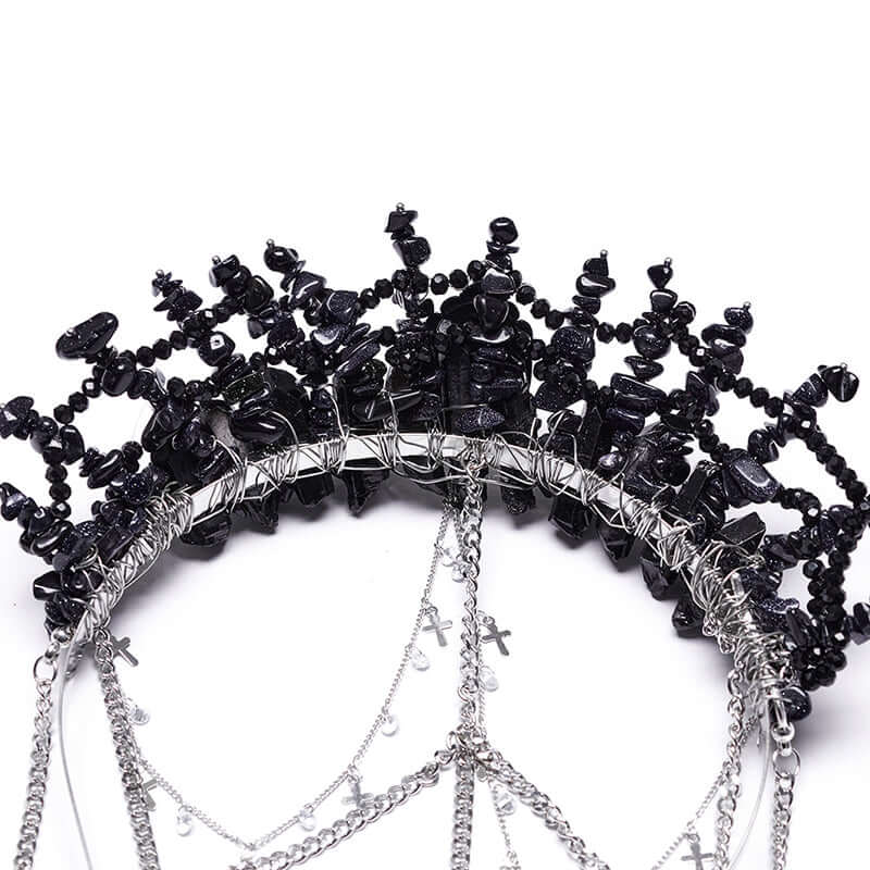 Gothic elegance captured in the handcrafted Punk Rave Effie black crystal and chain tassel headband, adorned with natural stones and a shimmering gemstone, perfect for dark chic soirées or adding a touch of royal rebellion to everyday wear.