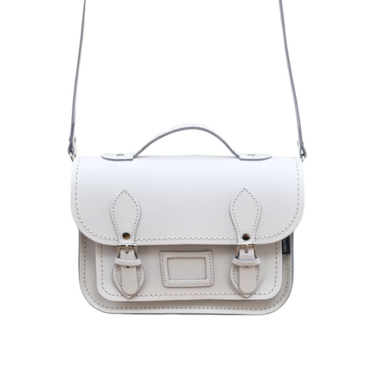 Elegant view of the Handmade White Leather Midi Satchel showcasing its adjustable and detachable strap for versatile styling.