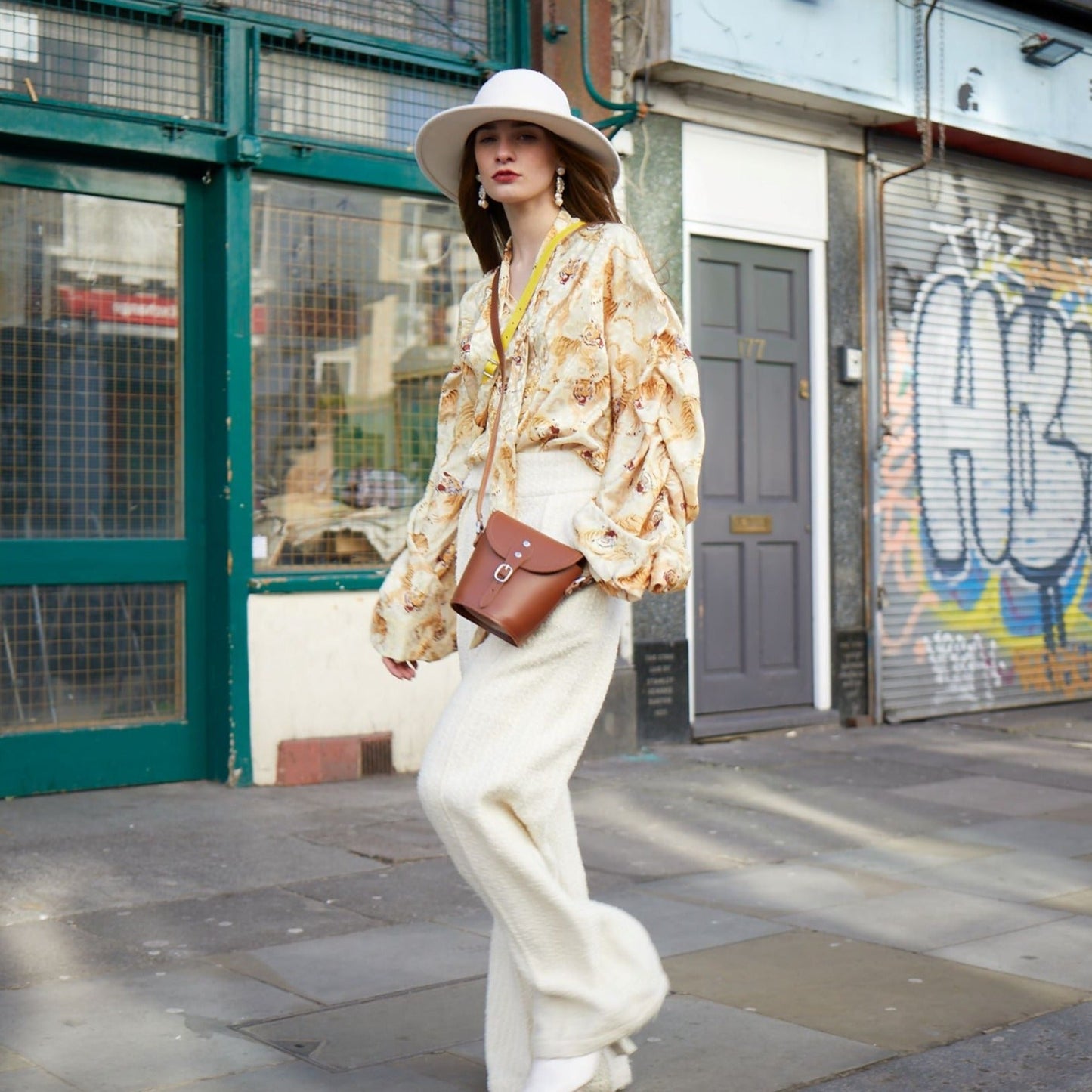 Interior of the Handmade Leather Barrel Bag showcasing its spacious compartment, perfect for essentials, with personalised engraving option for unique elegance.