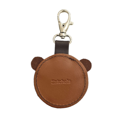 Artfully handstitched brown leather bear charm, showcasing eco-friendly design, ideal for gifting or personal use. Crafted in England.