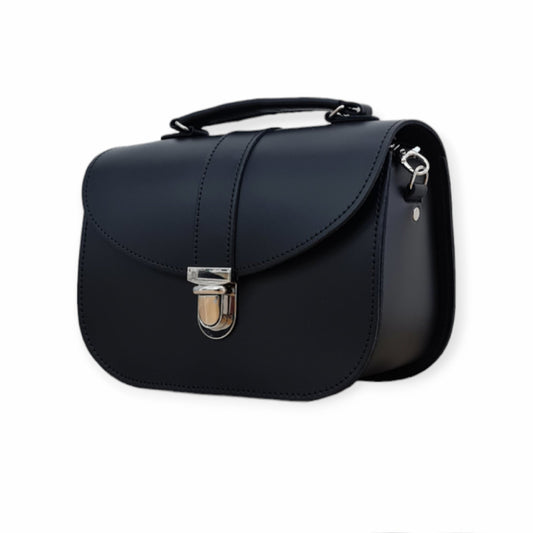 Interior view of Zatchels Olympia Leather Handbag, displaying spacious compartment and sophisticated design elements.