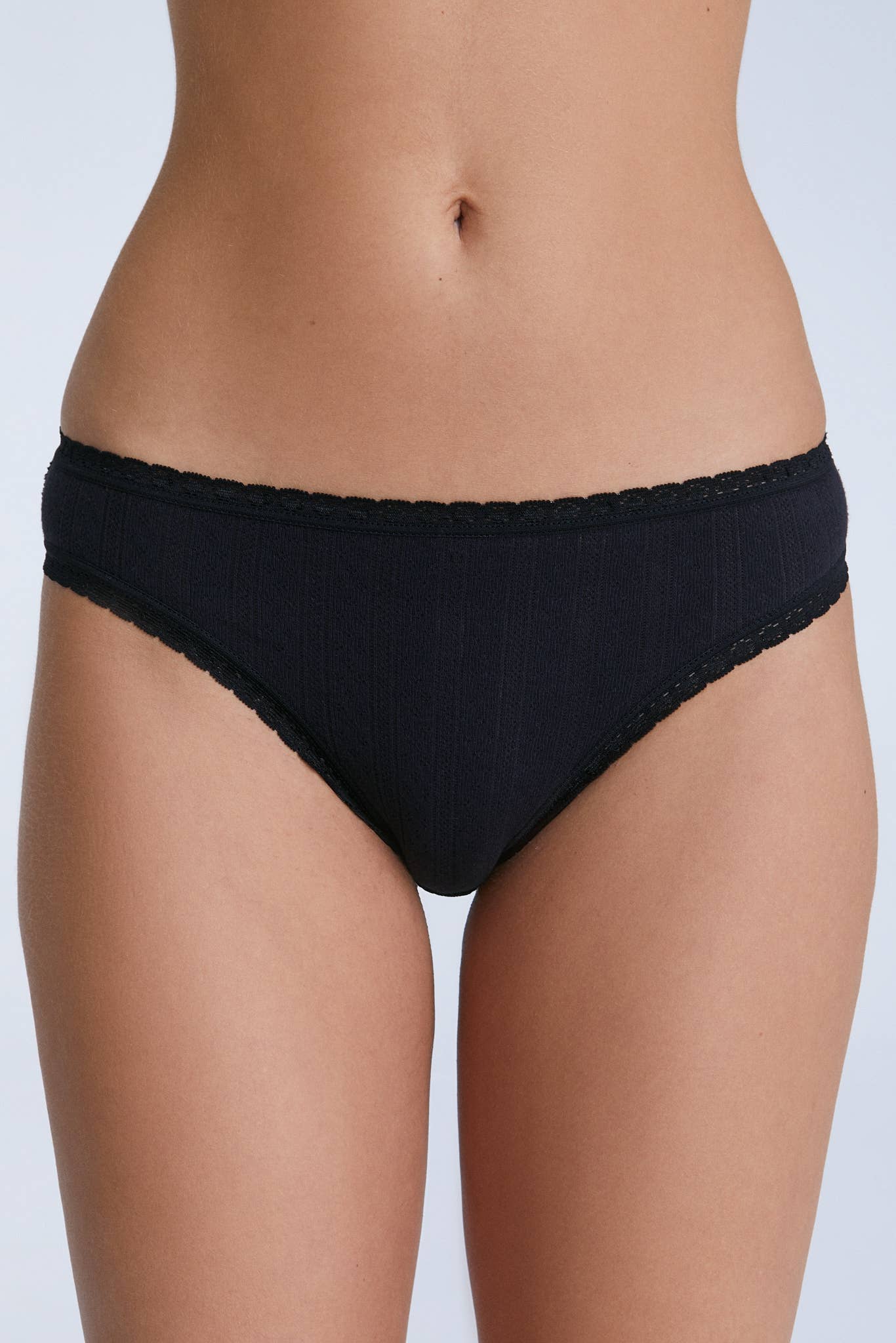 Chic display of the women’s slip dress with lace trim, embodying a timeless, feminine silhouette ideal for any occasion.