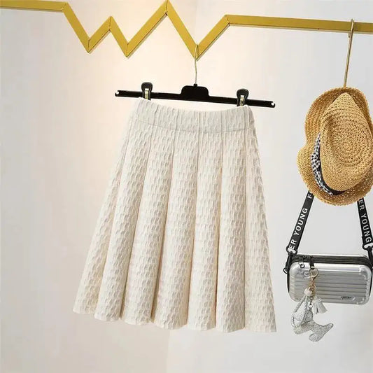 High Waist Knitted Skirt for Women in soft cream colour, radiating luxurious comfort and timeless elegance, perfect for stylish outfits.