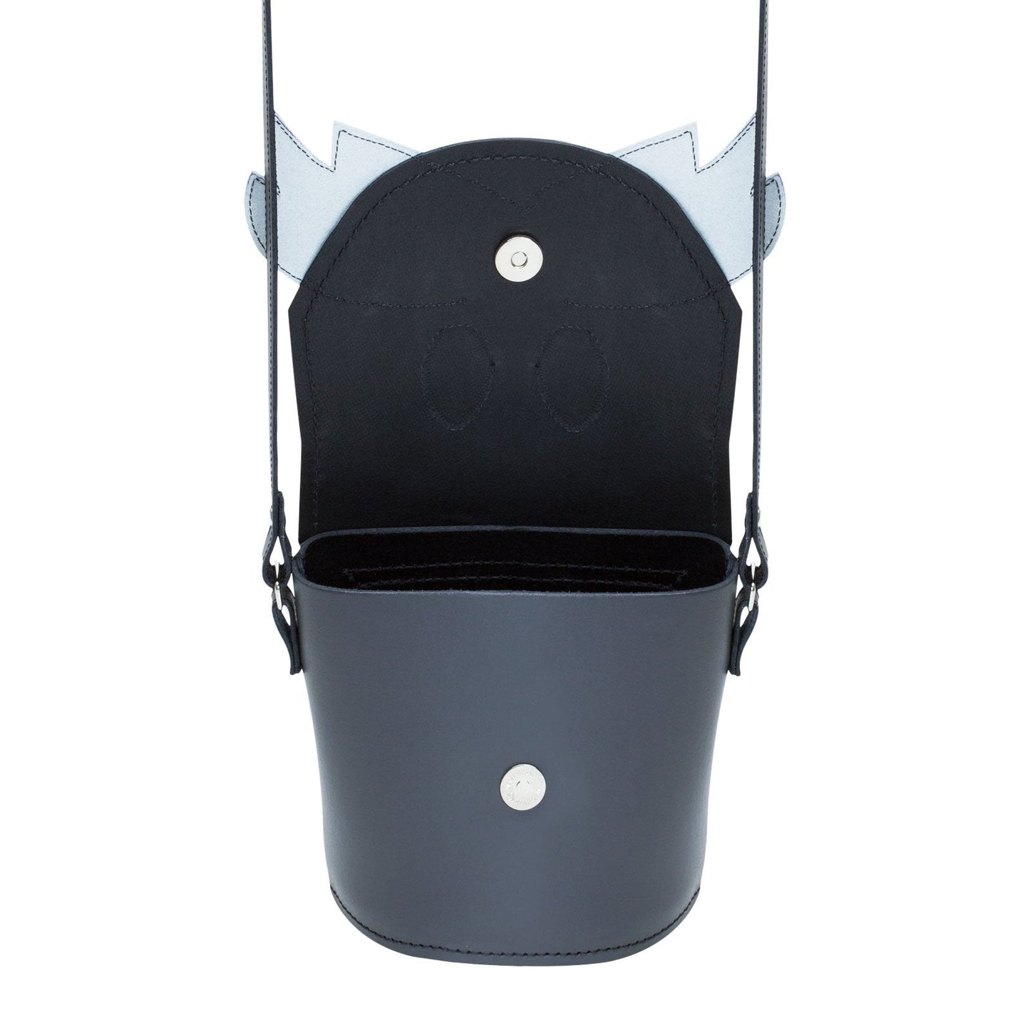 Chester Cat Barrel Bag worn casually, demonstrating its versatility and chic design, suitable for both day and evening wear.